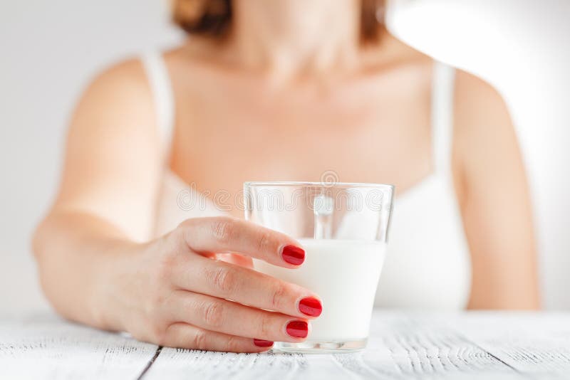Lait - lait de consommation de femme photo libre de droits Lait - lait de consommation de femme photo libre de droits