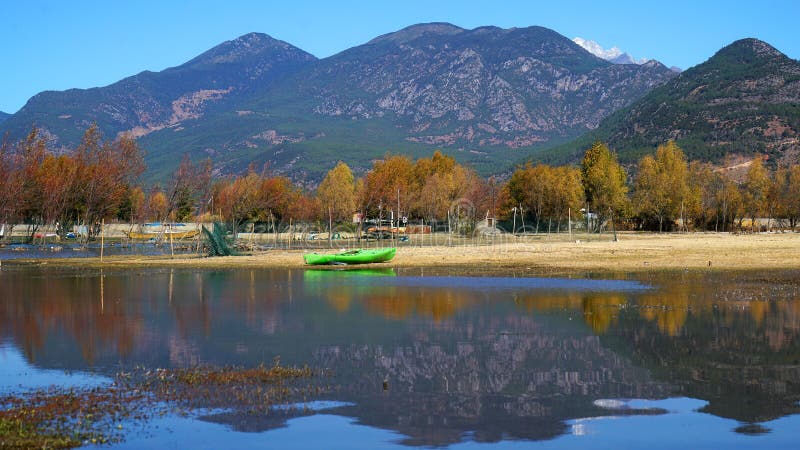 Lake in Autumn with Golden Trees