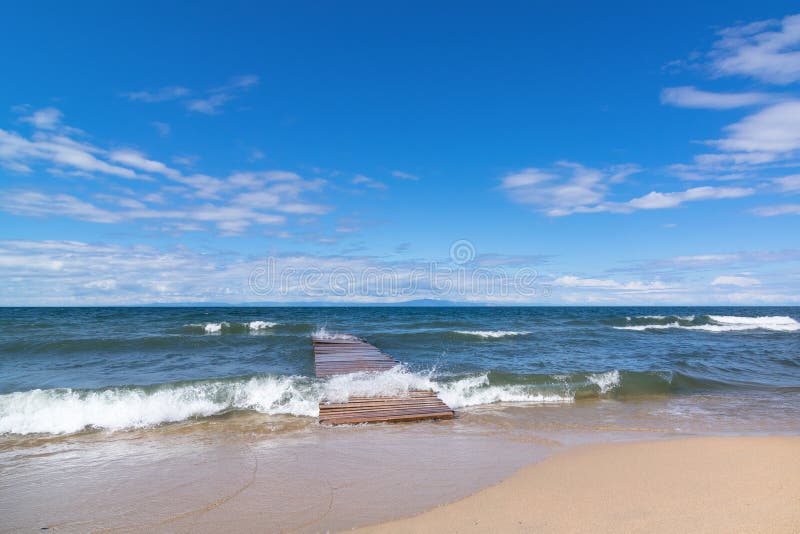 Lake Baikal. Wooden boat dock in the bay of the village of Goryachinsk, Buryatia, Russia