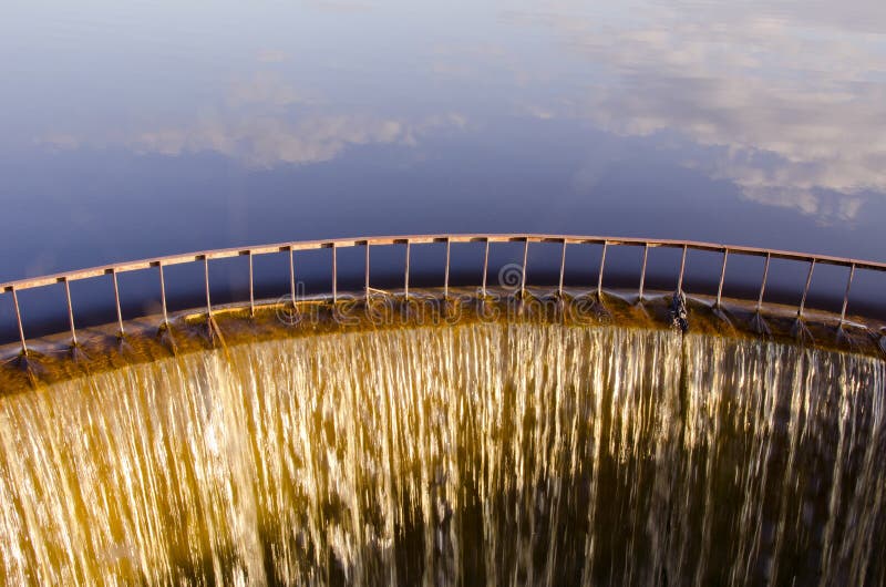 Lake dam waterfall in evening