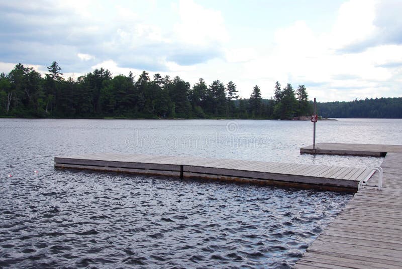 Lake docks stock photo. Image of reflections, retreat, pier 997548