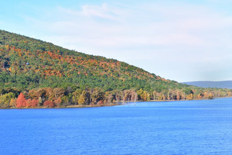 Lake with hillside road