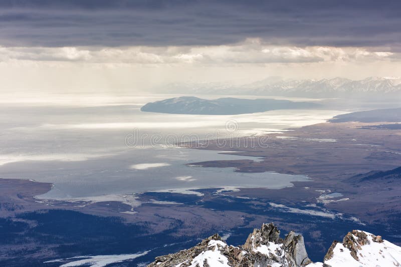 Lake Hovsgol from height of mountains. Overcast