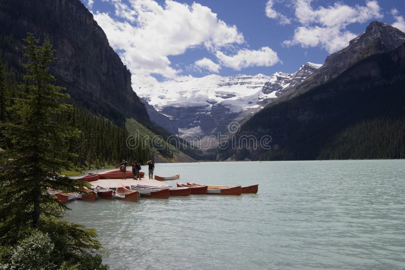 Lake louise with canoe rental stock photography
