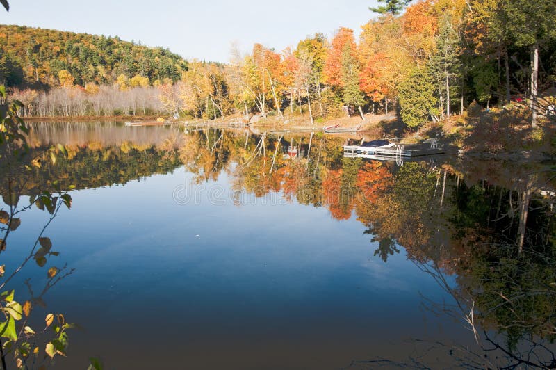 Lake mirror image in fall stock images Lake mirror image in fall stock images