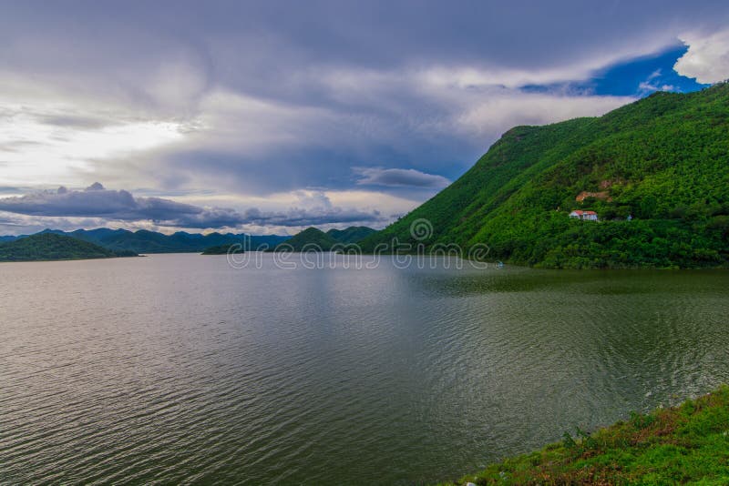 Lake in the mountains in Thailand There is a small house on the mountain. With beautiful scenery