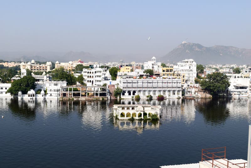 Lake Pichola, Udaipur city, Indian state of Rajasthan, May 2019 – Artificial fresh water lake, named after Picholi village. Two stock photos Lake Pichola, Udaipur city, Indian state of Rajasthan, May 2019 – Artificial fresh water lake, named after Picholi village. Two stock photos