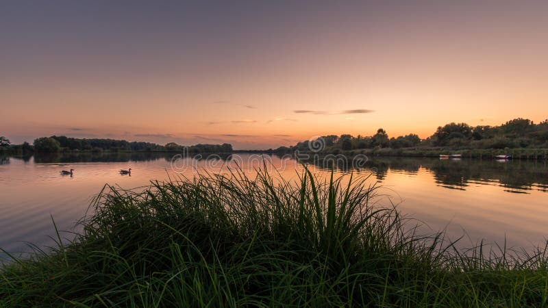 Lake Schulensmeer in Herk-de-Stad Flanders, Belgium at sunset