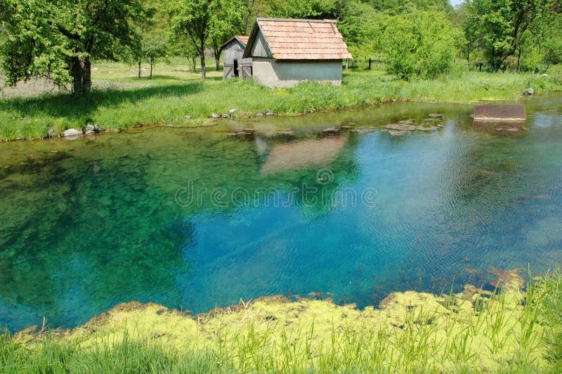 Lake with a small house