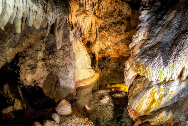 Lake and stalactites and stalagmites in Belianska cave in Slovakia
