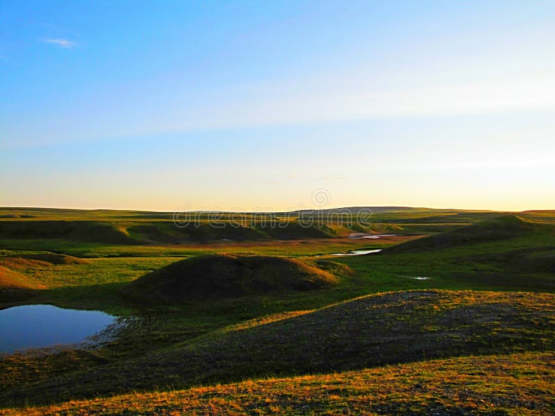 Lake in the summer tundra stock photo Lake in the summer tundra stock photo