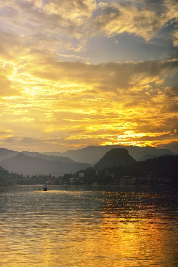 Lake Sunset stock photo. Image of wave, village, baihua - 43585870