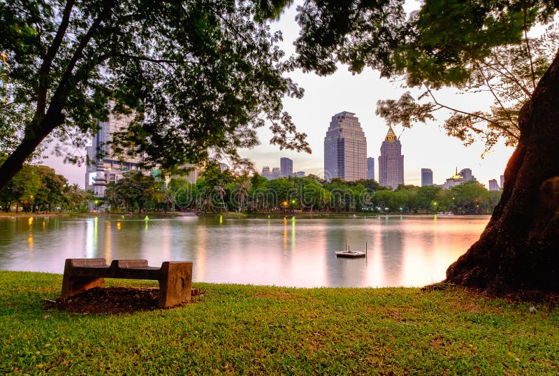 Lake view of Lumpini Park in the Thai capital`s city centre in B. Bangkok, Thailand - May 11, 2016: Lake view of Lumpini Park in the Thai capital`s city centre royalty free stock image Lake view of Lumpini Park in the Thai capital`s city centre in B. Bangkok, Thailand - May 11, 2016: Lake view of Lumpini Park in the Thai capital`s city centre royalty free stock image