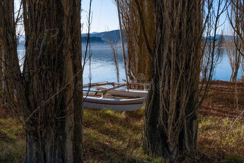 A Hobie Cat laid up in winter