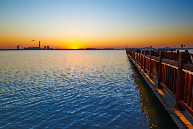 The lake and wooden trestle sunset