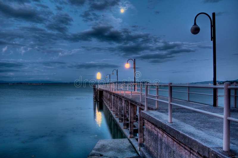 Lakeside pier before sunrise