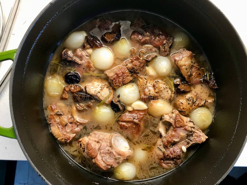 Lamb Arm Meat Casserole with Shallots and Dried Fruits royalty free stock image Lamb Arm Meat Casserole with Shallots and Dried Fruits royalty free stock image