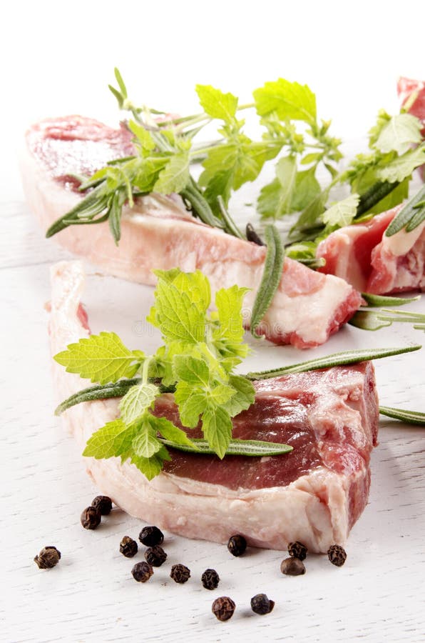 Lamb chops and some herbs stock image. Image of tasty 32789837