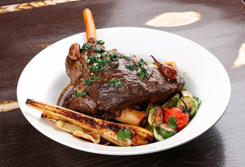 Lamb Leg Baked in Red Wine with Vegetables Stock Photo Image of glass