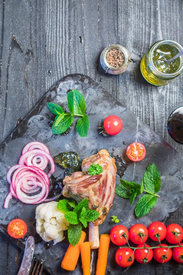 Lamb shank dinner stock photo. Image of green, jelly 101093142