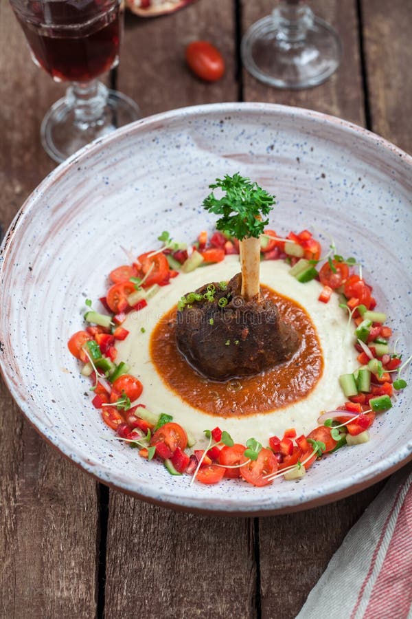 Lamb Shank with Eggplant Puree, Traditional Turkish Dish Stock Image