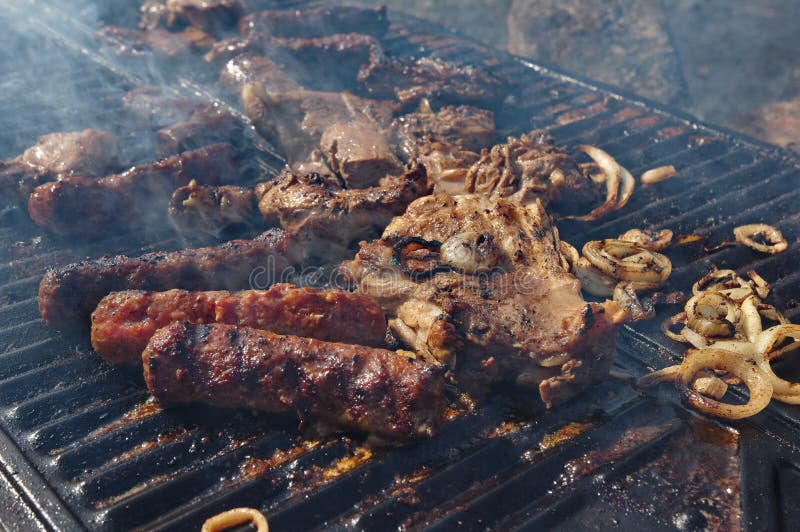 Lamb steak on the grill stock photo. Image of chop, green 91067790