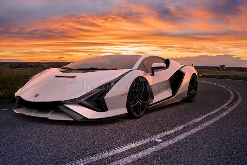 Lamborghini Sian FKP 37 on the road during a spectacular sunset