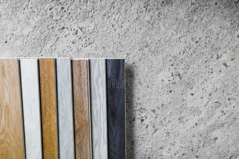 Laminate Flooring Planks Variations on Concrete Floor Stock Image