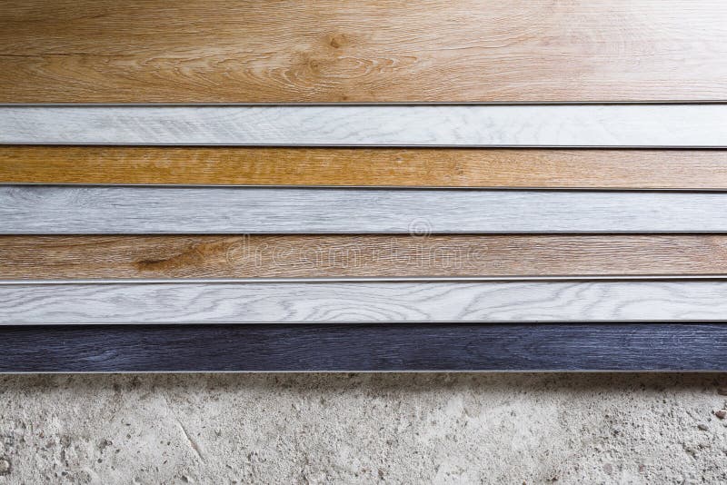Laminate Flooring Planks Variations on Concrete Floor Stock Image