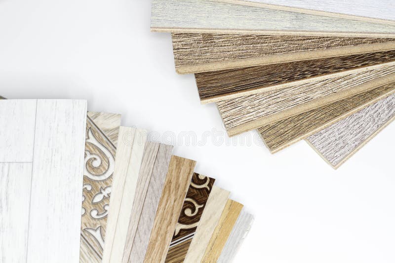 Laminate and linoleum. Choice between. Comparison of floor coverings. royalty free stock photo