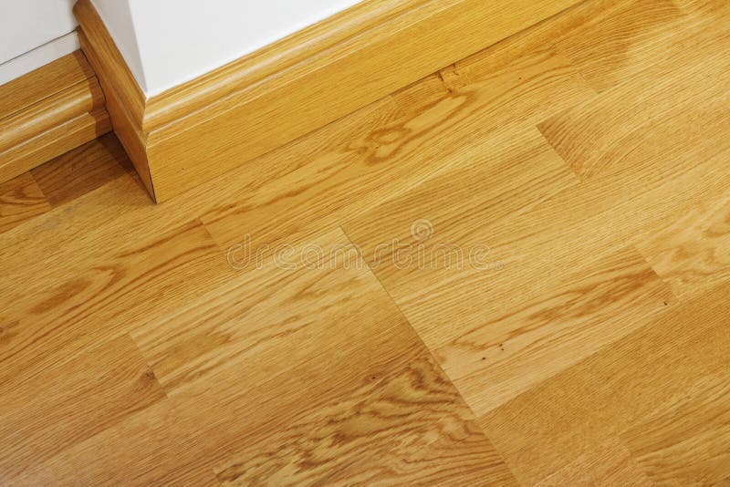 Laminate Wooden Flooring And Skirting Boards Stock Photo Image of
