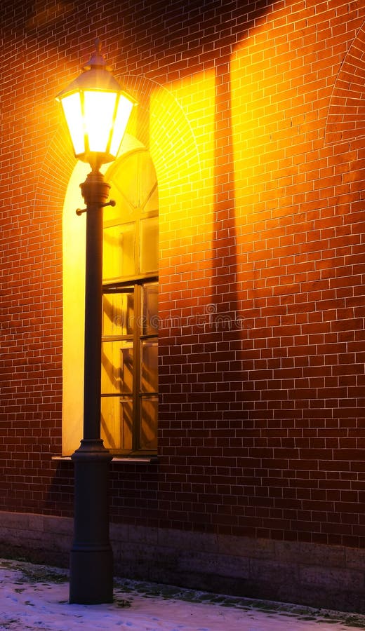 Lamp and brick wall