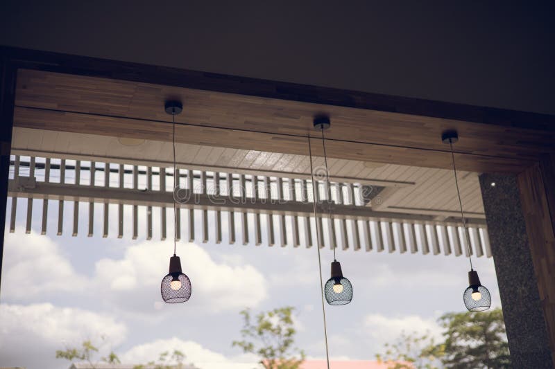 Lamp Hanging in Front of a Coffee Shop for Decoration Stock Photo
