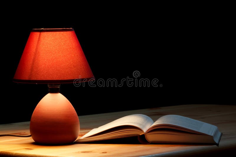 Lamp illuminating a book