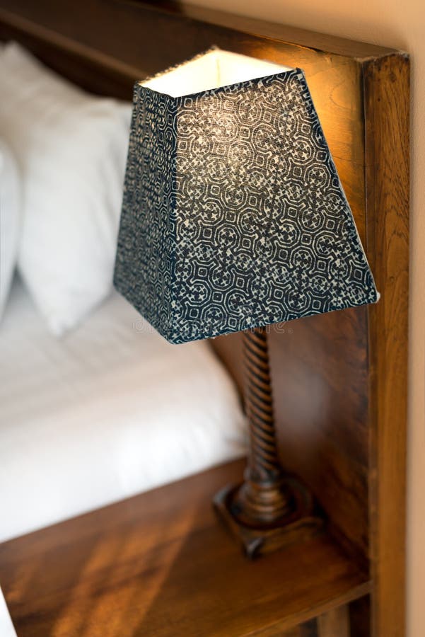 Lamp on a Night Table Next To Bed Stock Image Image of metal, decor