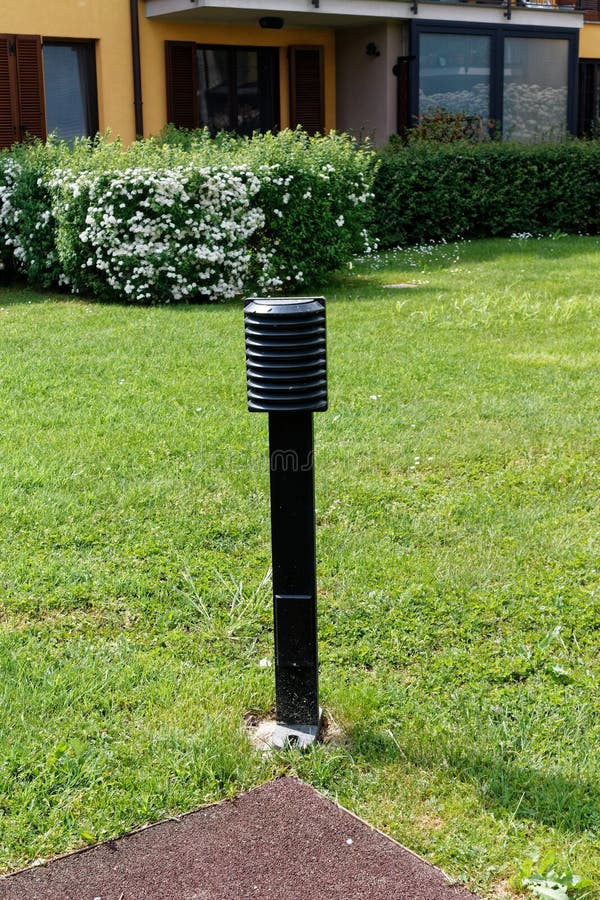 Lamp Post on Backyard, Light Equipment, Gardening Lantern Stock Photo