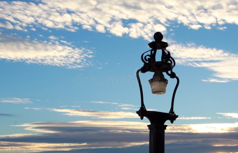 Lamp post and the sunset stock photo. Image of boulevard 54343468