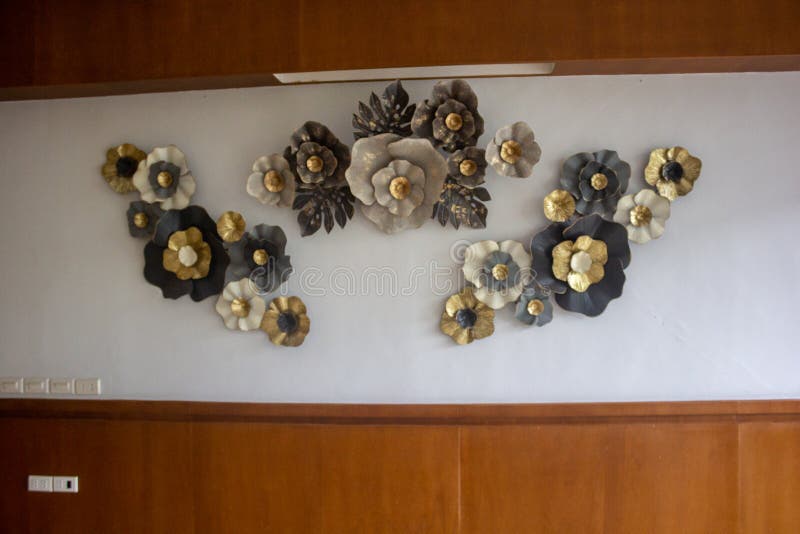 Lamp socket made as flower shape. Decorative flower hanging on the wall royalty free stock photography