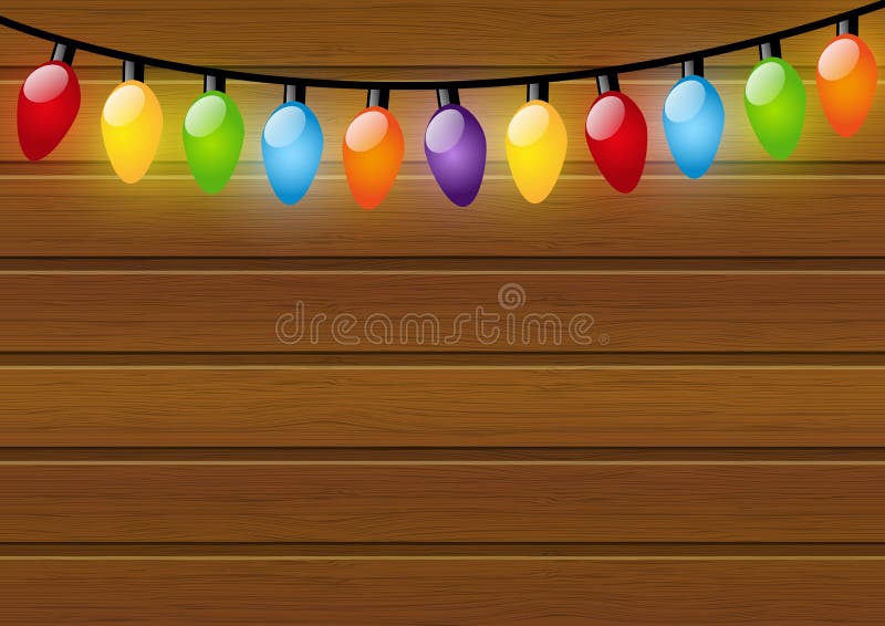 Christmas light bulbs on wooden background. Christmas light bulbs on wooden background