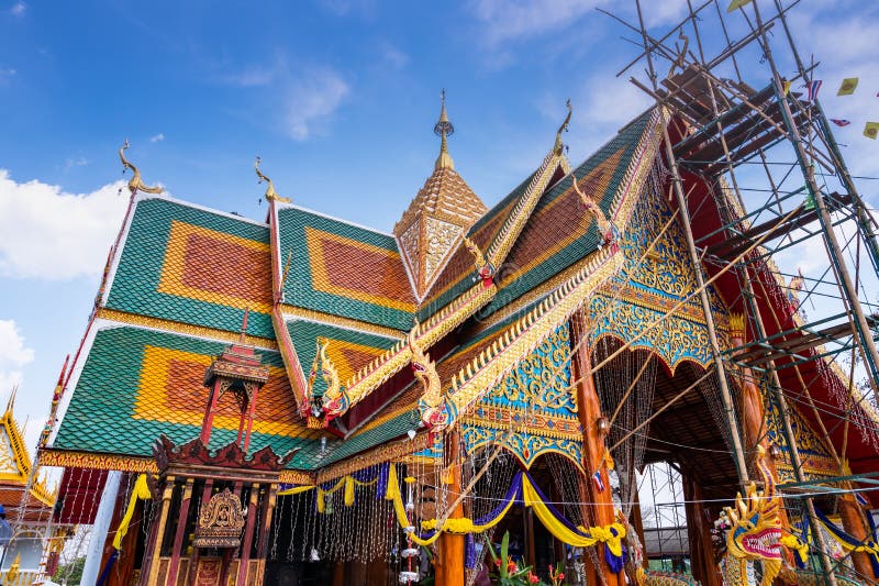 LAMPANG, THAILAND - March 7, 2020 :  The ceremony of mounting the gable-finial at Phrathat San Don temple