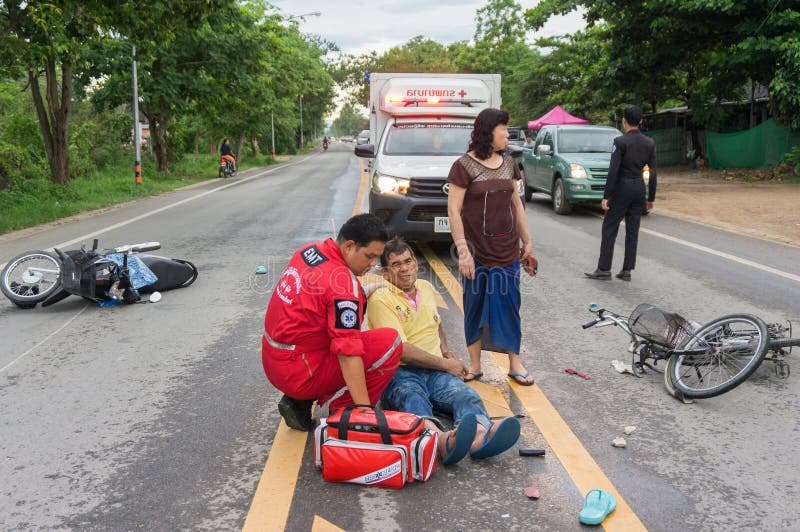 LAMPHUN, THAILAND - JULY 04,2017 : Motorcycle accident on the road and crashed with motorcyele which causing the rider serious injury on July 04, 2017 in Lamphun, Thailand.