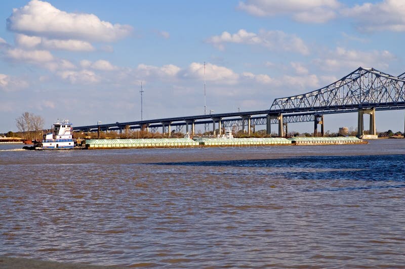 Lancha a remolque del río Misisipi