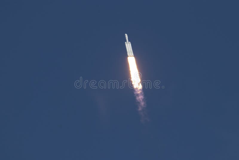 Elon Musk`s Space-X Falcon Heavy rocket blasts off into a hazy Florida sky on it`s maiden launch from Kennedy Space Center, carry a Tesla roadster toward a perpetual deep space orbit around the sun and mars, February 6, 2018. Elon Musk`s Space-X Falcon Heavy rocket blasts off into a hazy Florida sky on it`s maiden launch from Kennedy Space Center, carry a Tesla roadster toward a perpetual deep space orbit around the sun and mars, February 6, 2018