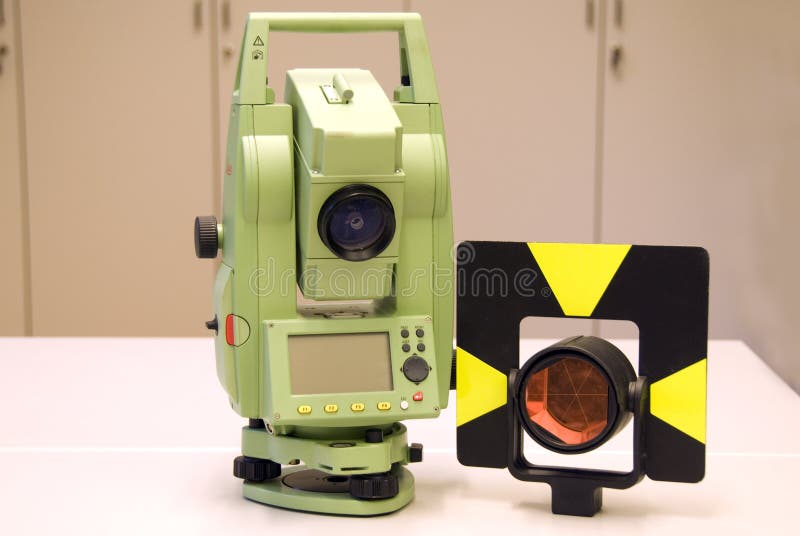 Total station, land surveying and prism. Altometer - geodetic instrument