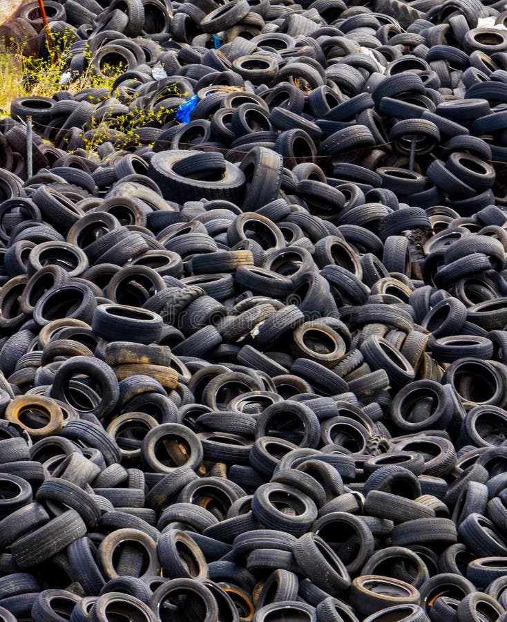 Landfill with Old Tires and Tyres for Recycling. Reuse of the Waste