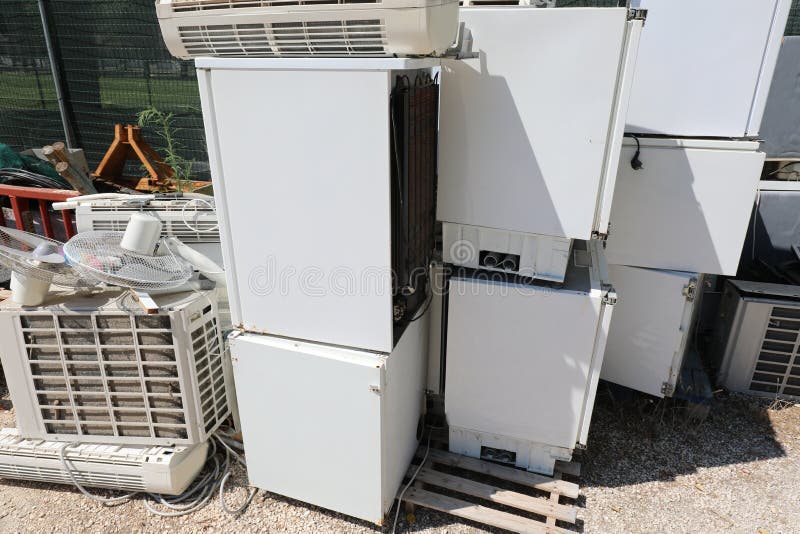 Landfill with Scrap of Broken Appliances and Polluting Material Stock