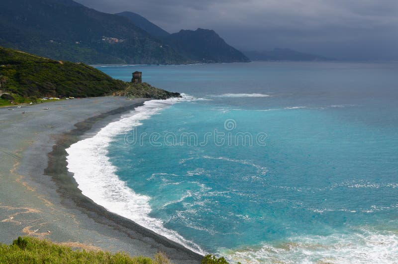 Landscape: Beach and tower in Corsica