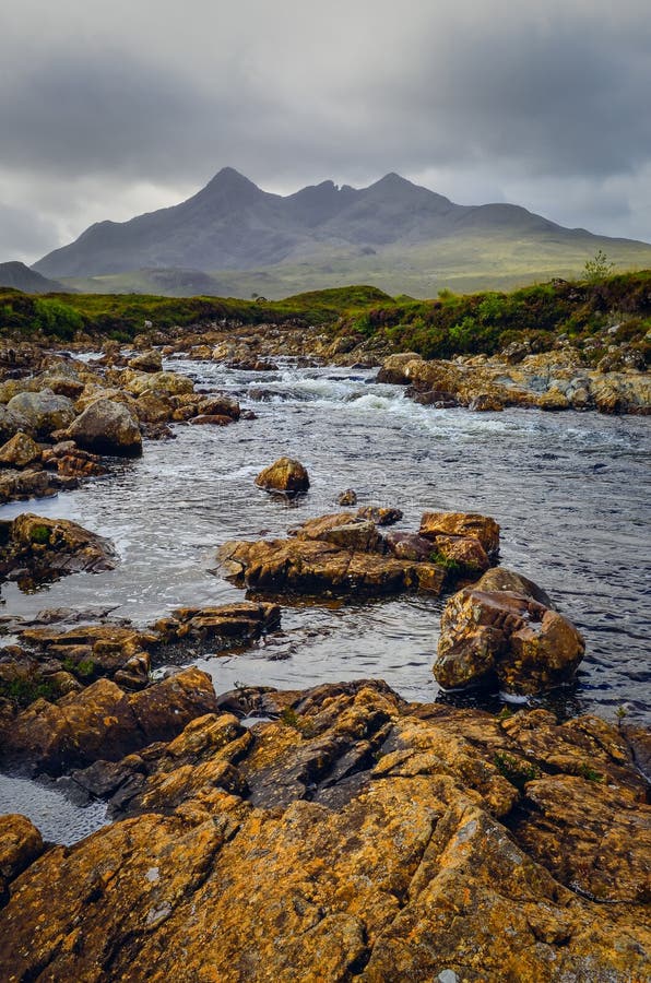 Landscape of Cuillin hills and river, Scottish highlands