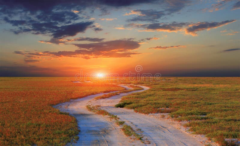Dirt road to sunset