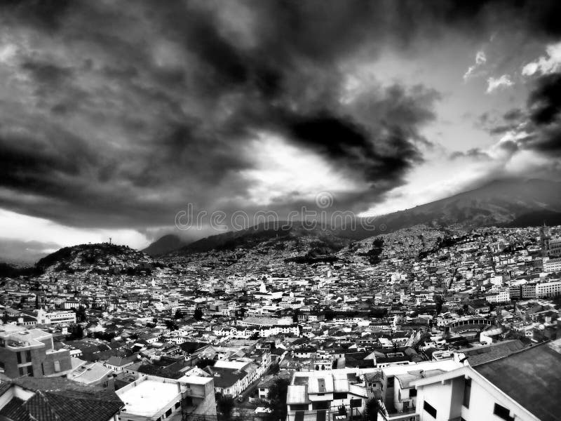 Landscape with dramatic clouds over Quito, Ecuador : travel and tourism